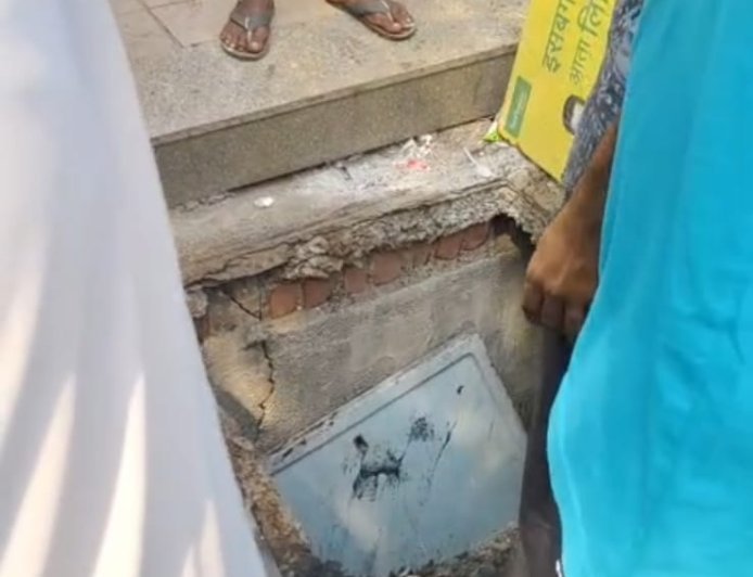 भाईंदर में गटर का ढक्कन टूटने से महिला और बच्चा गिरे, दोनों घायल